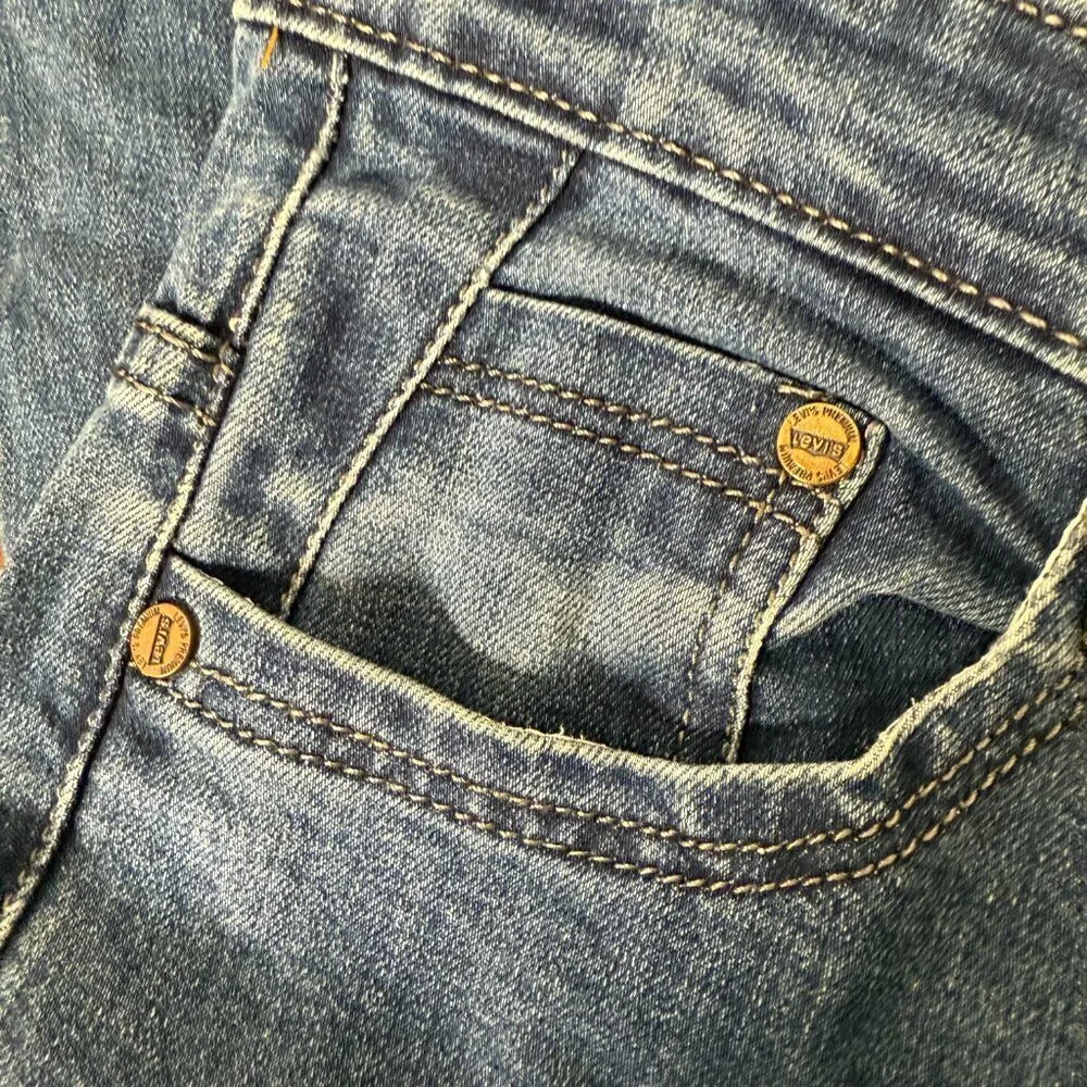 Levi's Jeans 30/34 Medium Wash Tapered Leg Leather Tag
